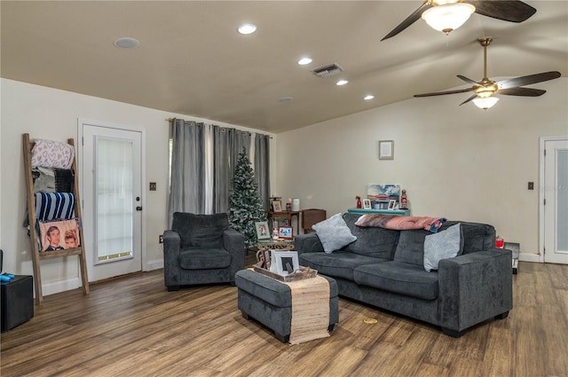 2219 New Jersey Rd, Lakeland, FL 33803 - living area featuring wood finished floors, ceiling fan, vaulted ceiling, recessed lighting, and baseboards