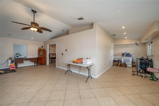 2219 New Jersey Rd, Lakeland, FL 33803 - interior space featuring vaulted ceiling, a ceiling fan, recessed lighting, baseboards, and light tile patterned flooring