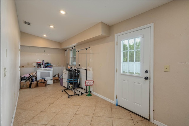 2219 New Jersey Rd, Lakeland, FL 33803 - laundry area with baseboards, recessed lighting, and light tile patterned floors