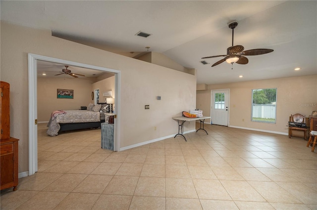 2219 New Jersey Rd, Lakeland, FL 33803 - living room featuring ceiling fan, light tile patterned flooring, lofted ceiling, recessed lighting, and baseboards