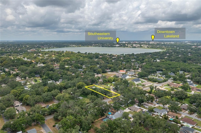 2219 New Jersey Rd, Lakeland, FL 33803 - aerial view of residential area with a large body of water and property parcel outlined