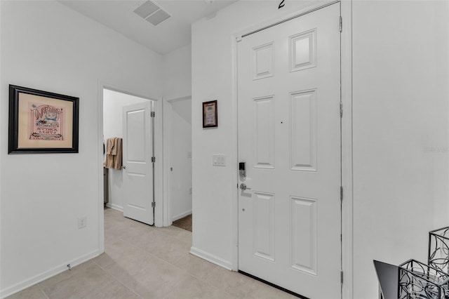 280 Pershing St, Bartow, FL 33830 - entrance foyer with baseboards and light tile patterned floors