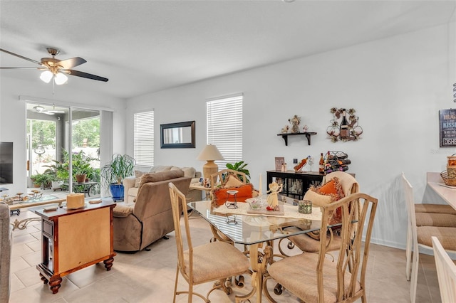 280 Pershing St, Bartow, FL 33830 - dining space with light tile patterned floors and a ceiling fan