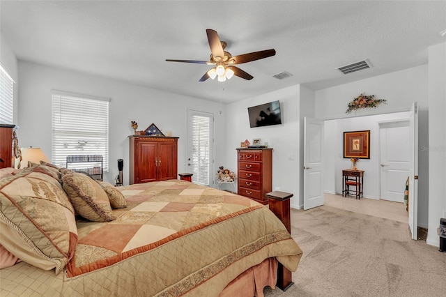 280 Pershing St, Bartow, FL 33830 - bedroom featuring light carpet, ceiling fan, and baseboards