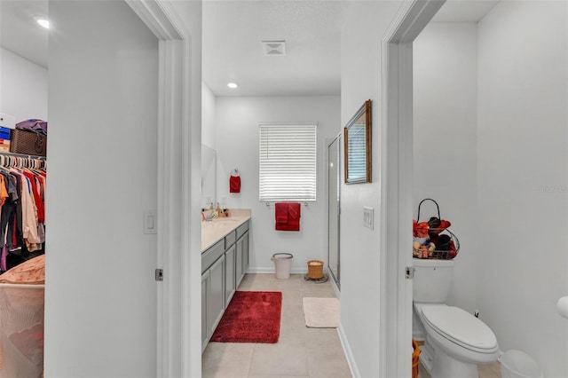 280 Pershing St, Bartow, FL 33830 - full bath featuring a shower stall, tile patterned flooring, vanity, toilet, and recessed lighting