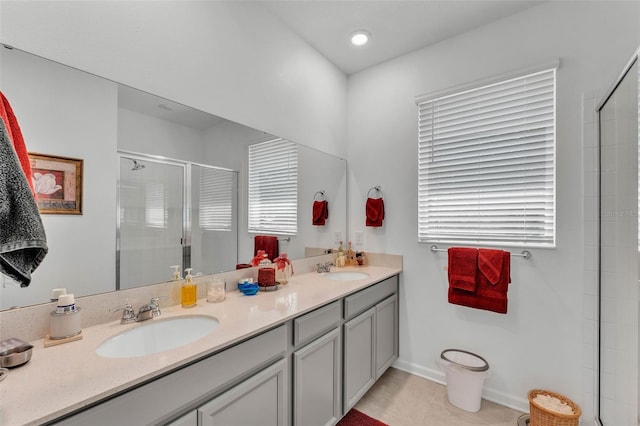 280 Pershing St, Bartow, FL 33830 - full bathroom with a stall shower, tile patterned flooring, and double vanity