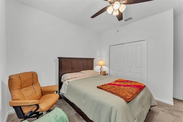 280 Pershing St, Bartow, FL 33830 - bedroom with light carpet, a closet, baseboards, and ceiling fan