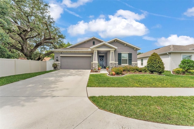280 Pershing St, Bartow, FL 33830 - craftsman house with an attached garage, driveway, stucco siding, and stone siding