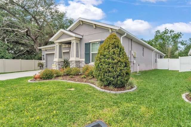280 Pershing St, Bartow, FL 33830 - view of front of home featuring stucco siding, concrete driveway, and an attached garage