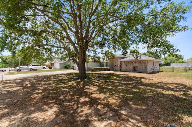 790 Chelsea Way, Lake Wales, FL 33853 - view of yard featuring a garage and driveway