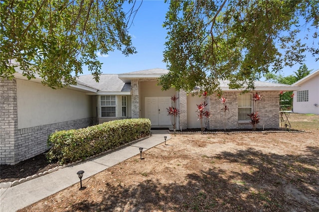 790 Chelsea Way, Lake Wales, FL 33853 - ranch-style home featuring brick siding and a garage