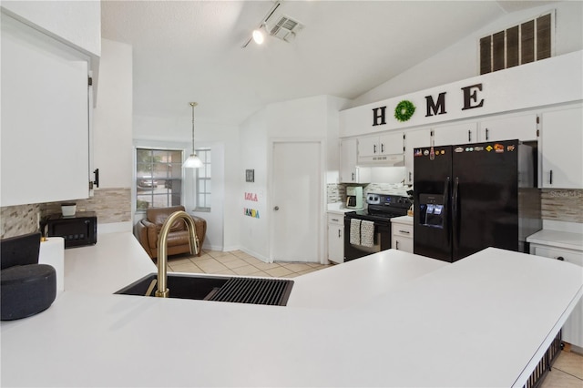 790 Chelsea Way, Lake Wales, FL 33853 - kitchen featuring black appliances, tasteful backsplash, under cabinet range hood, light tile patterned flooring, and light countertops