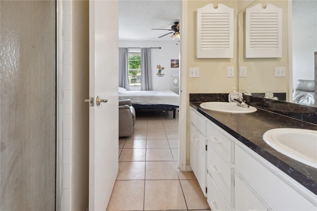790 Chelsea Way, Lake Wales, FL 33853 - bathroom with connected bathroom, ceiling fan, double vanity, and tile patterned floors