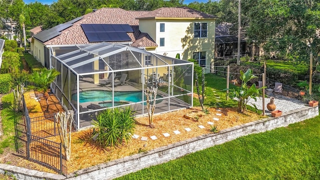 3620 Cordgrass Dr, Valrico, FL 33596 - rear view of property with a gate, a patio area, stucco siding, and glass enclosure
