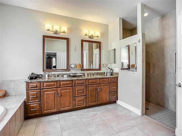 3620 Cordgrass Dr, Valrico, FL 33596 - bathroom with walk in shower, tile patterned floors, double vanity, and a bath