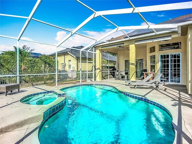 3620 Cordgrass Dr, Valrico, FL 33596 - view of swimming pool featuring a patio area, a ceiling fan, a pool with connected hot tub, and a lanai