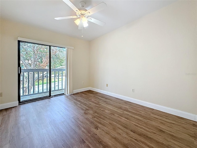 6350 92nd Pl N Unit 2206, Pinellas Park, FL 33782 - empty room featuring dark wood-type flooring, baseboards, and a ceiling fan