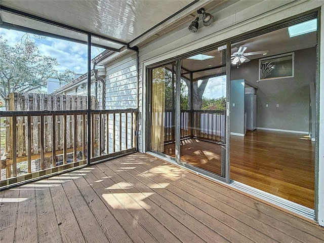 6350 92nd Pl N Unit 2206, Pinellas Park, FL 33782 - unfurnished sunroom with a ceiling fan