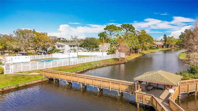 6350 92nd Pl N Unit 2206, Pinellas Park, FL 33782 - dock area featuring a gazebo, a water view, and a fenced backyard