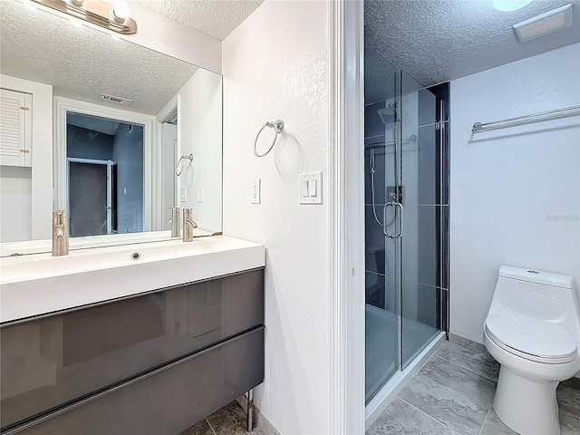 6350 92nd Pl N Unit 2206, Pinellas Park, FL 33782 - full bath featuring a textured ceiling, toilet, a stall shower, and vanity
