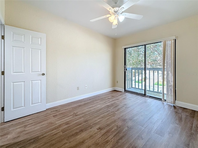 6350 92nd Pl N Unit 2206, Pinellas Park, FL 33782 - unfurnished room featuring wood finished floors, baseboards, and a ceiling fan