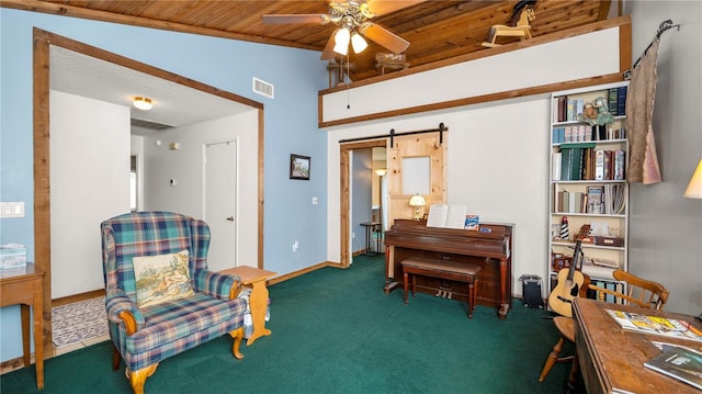 417 Yolonda Ct, Lakeland, FL 33809 - sitting room with a barn door, carpet floors, ceiling fan, wooden ceiling, and baseboards