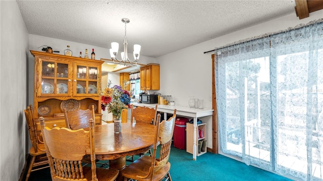 417 Yolonda Ct, Lakeland, FL 33809 - carpeted dining space with a chandelier and a textured ceiling