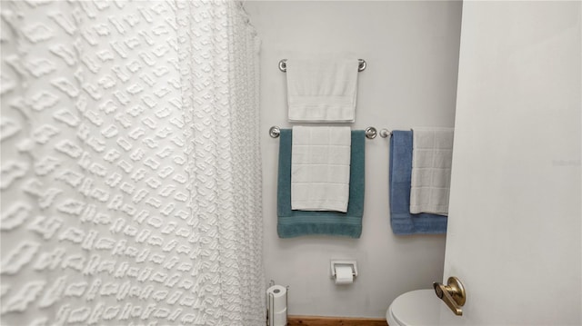 417 Yolonda Ct, Lakeland, FL 33809 - full bathroom with toilet and a shower with curtain