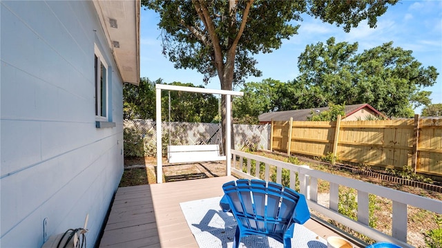 417 Yolonda Ct, Lakeland, FL 33809 - wooden deck featuring a fenced backyard