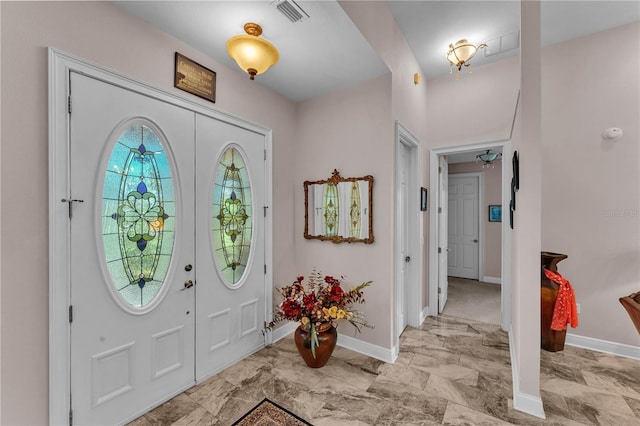 5033 Sugar Bay St, Sebring, FL 33872 - entrance foyer with baseboards and light marble finish flooring