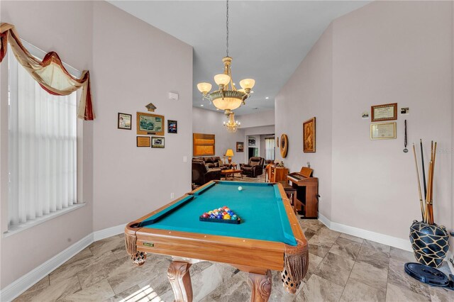 5033 Sugar Bay St, Sebring, FL 33872 - playroom featuring a chandelier, baseboards, and billiards