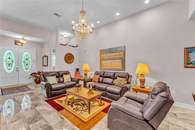 5033 Sugar Bay St, Sebring, FL 33872 - living room featuring a chandelier, light marble finish flooring, recessed lighting, and baseboards