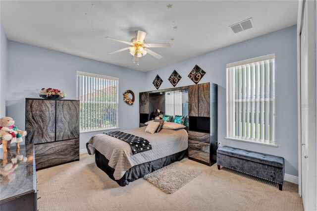 5033 Sugar Bay St, Sebring, FL 33872 - bedroom featuring carpet, baseboards, and ceiling fan