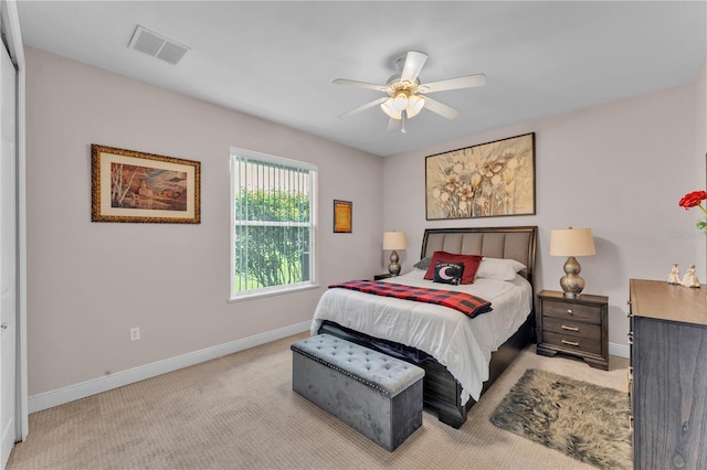5033 Sugar Bay St, Sebring, FL 33872 - bedroom featuring baseboards, light carpet, and ceiling fan