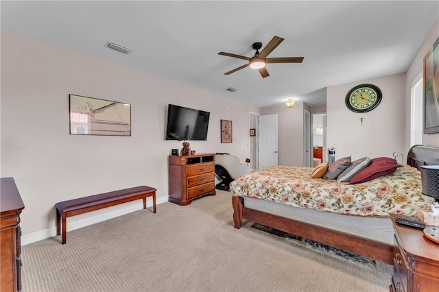 5033 Sugar Bay St, Sebring, FL 33872 - bedroom featuring light colored carpet, baseboards, and a ceiling fan