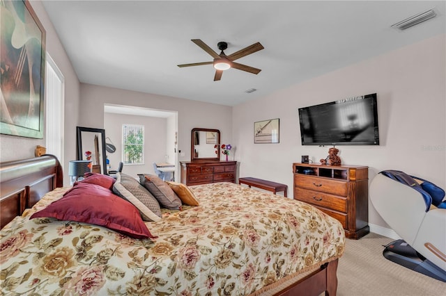 5033 Sugar Bay St, Sebring, FL 33872 - bedroom featuring light colored carpet, a ceiling fan, and baseboards