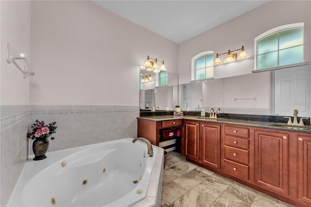 5033 Sugar Bay St, Sebring, FL 33872 - bathroom featuring a jetted tub and double vanity