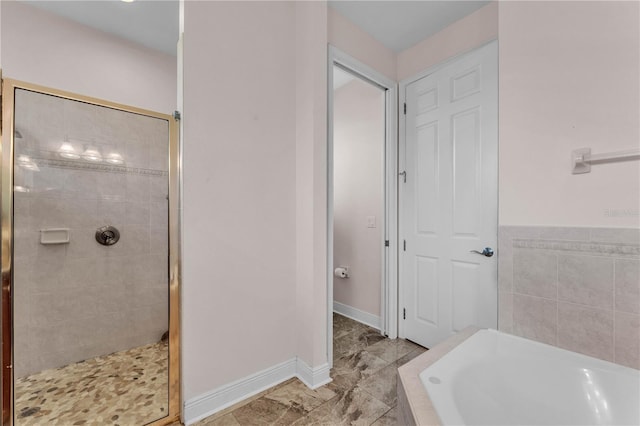 5033 Sugar Bay St, Sebring, FL 33872 - bathroom featuring a stall shower and a bath