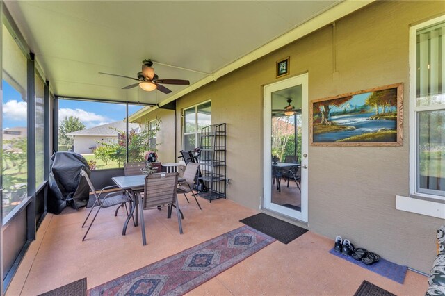5033 Sugar Bay St, Sebring, FL 33872 - sunroom featuring a ceiling fan and outdoor dining area
