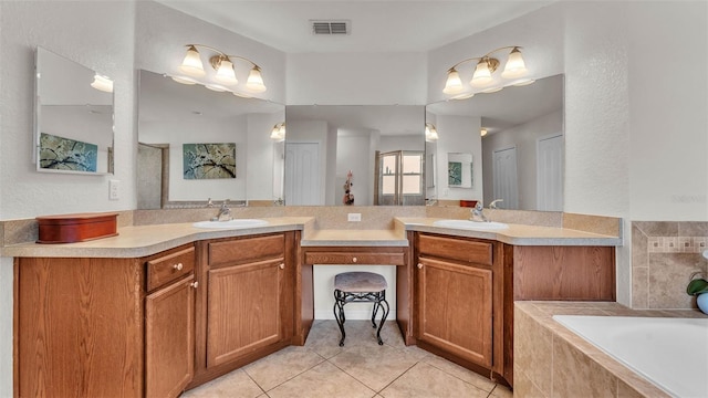 bathroom featuring tile patterned floors, a garden tub, and double vanity