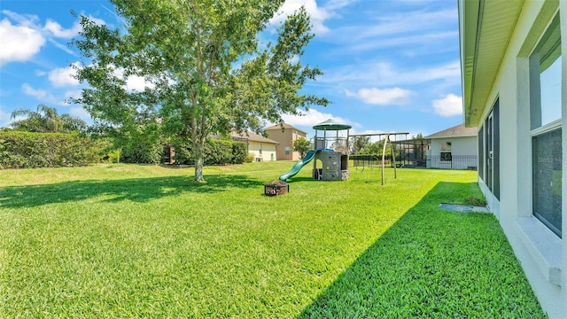 view of yard with a playground