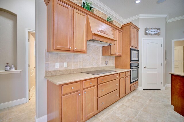 2032 Indian Sky Cir, Lakeland, FL 33813 - kitchen with appliances with stainless steel finishes, tasteful backsplash, custom exhaust hood, light countertops, and baseboards