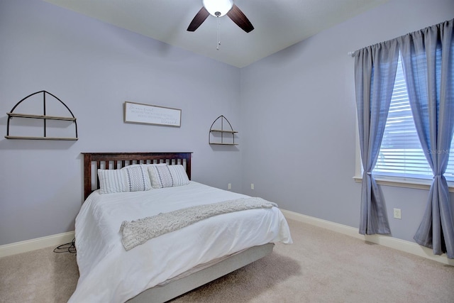 2032 Indian Sky Cir, Lakeland, FL 33813 - carpeted bedroom featuring baseboards and a ceiling fan