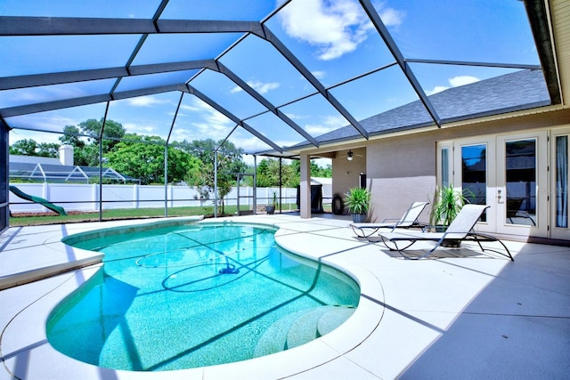 2032 Indian Sky Cir, Lakeland, FL 33813 - view of pool featuring french doors, a patio, fence, and a lanai