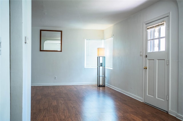 2710 Fairmount Ave, Lakeland, FL 33803 - spare room featuring dark wood finished floors and baseboards