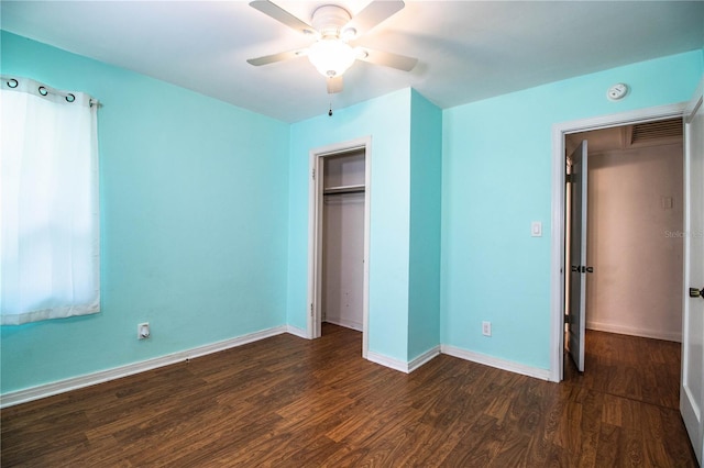 2710 Fairmount Ave, Lakeland, FL 33803 - unfurnished bedroom featuring dark wood-style flooring, baseboards, a closet, and a ceiling fan
