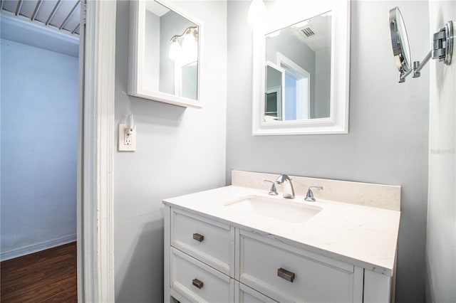 2710 Fairmount Ave, Lakeland, FL 33803 - bathroom with wood finished floors and vanity