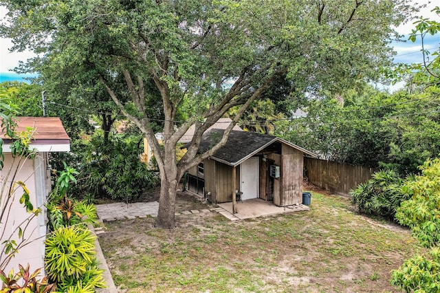 2710 Fairmount Ave, Lakeland, FL 33803 - view of yard featuring fence and an outdoor structure