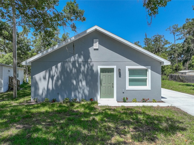 1415 Southern Ave, Lakeland, FL 33803 - view of front of property with a front yard