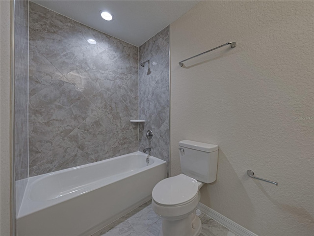 1415 Southern Ave, Lakeland, FL 33803 - bathroom featuring marble look tile flooring, toilet, shower / washtub combination, and recessed lighting